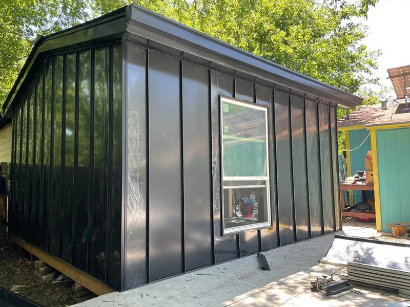 Black standing seam metal wall panels for Roof Inspection in Gallup