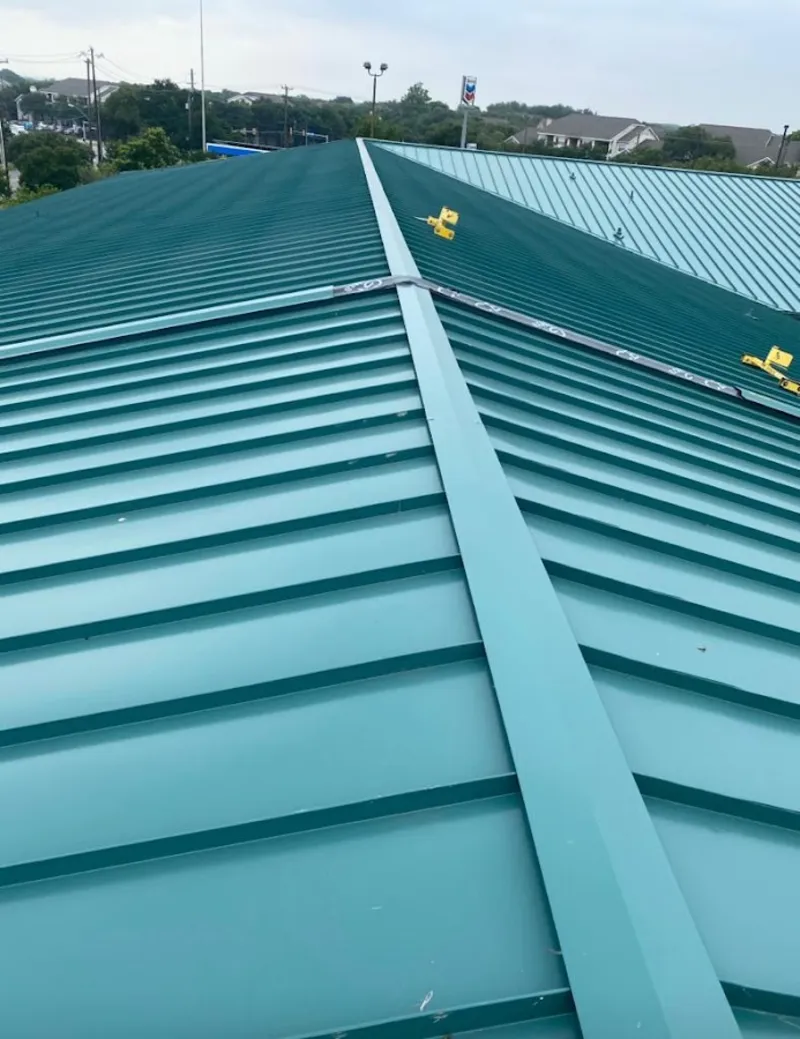 Green commercial metal roof ridge and valley for Metal Roof Repair in Gallup
