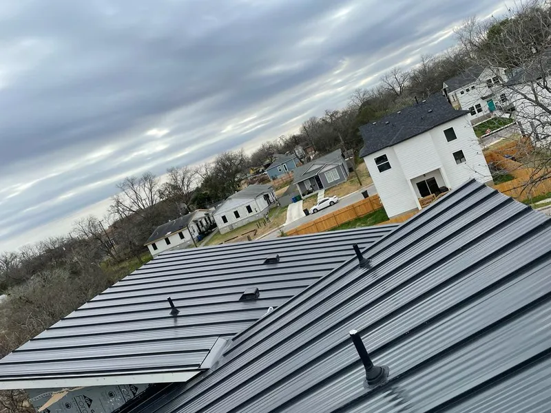 Standing seam metal roof panels with vents for Skylight Repair in Gallup